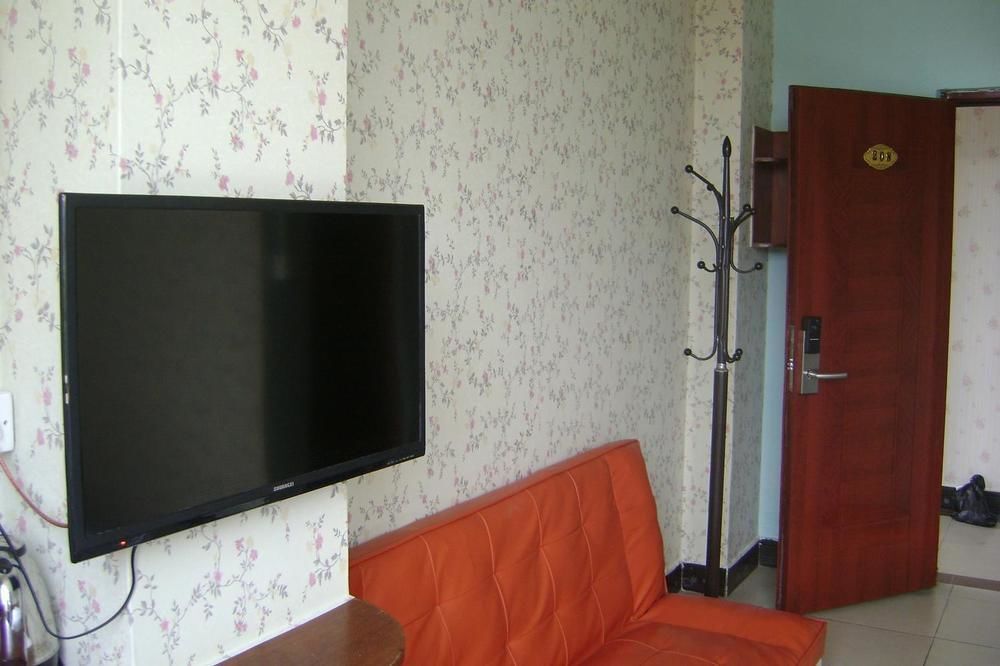 Гуанчжоу: Jiuri Business Apartment
