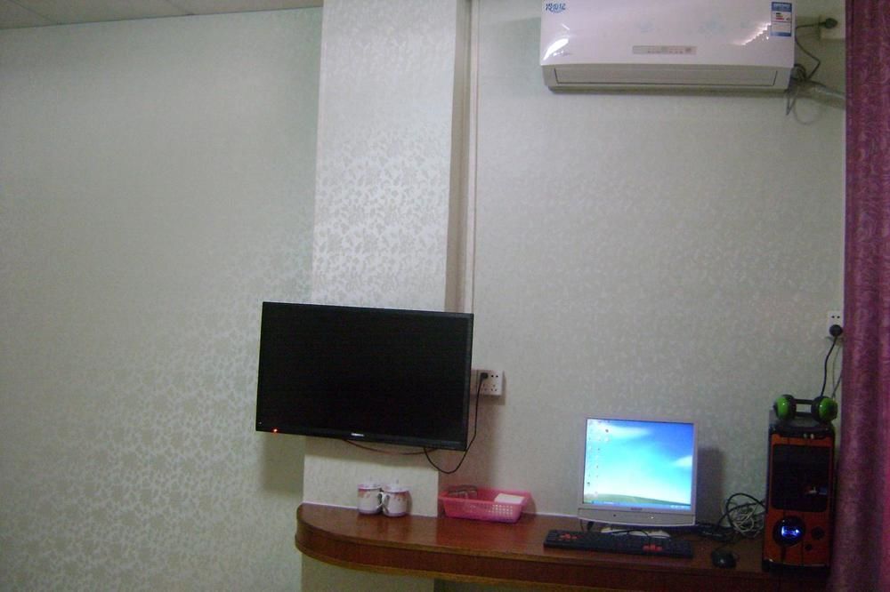 Гуанчжоу: Jiuri Business Apartment