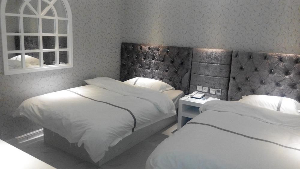 Циндао: Yi Jia 99 Boutiqe Hotel