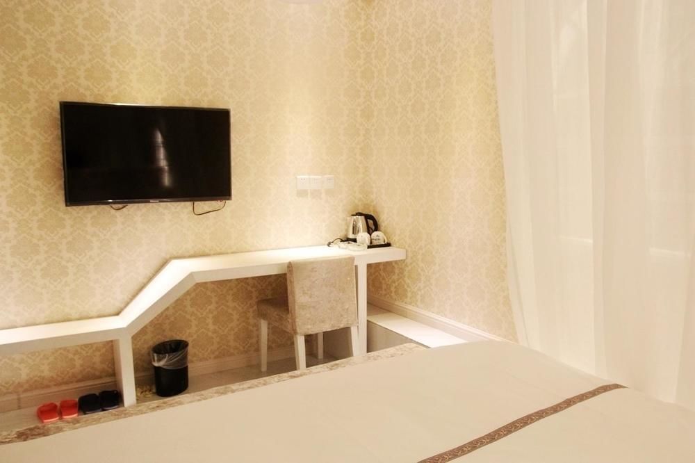 Циндао: Yi Jia 99 Boutiqe Hotel