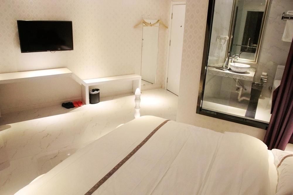 Циндао: Yi Jia 99 Boutiqe Hotel
