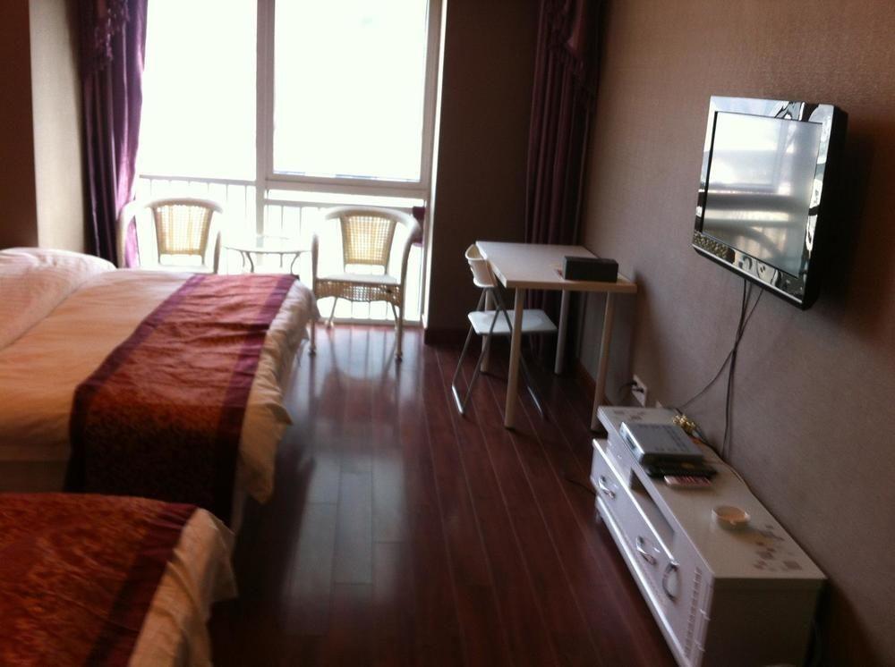 Xin Yu Hotel Apartment- Dalian — фото 1