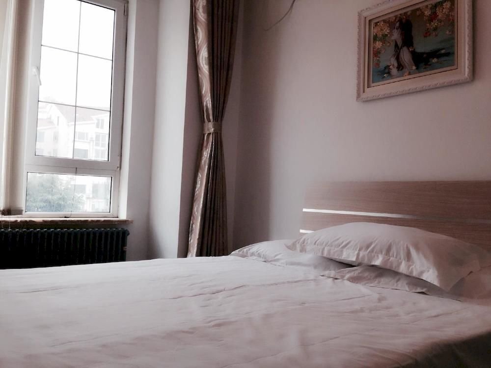Циндао: Qingdao Langqin Sea View Holiday Villa