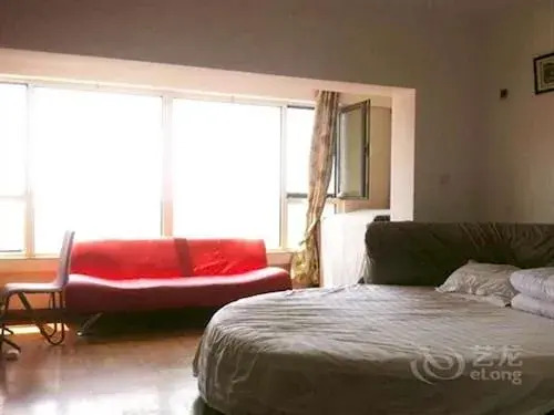 Далянь: Holiday Hotel Apartment