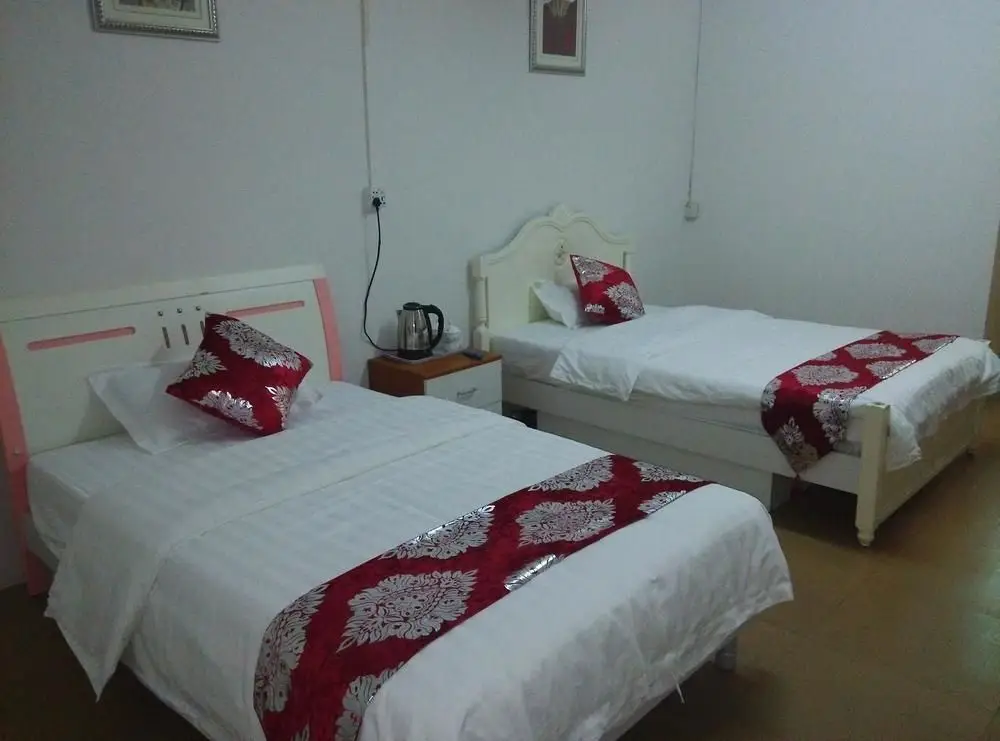 Гуанчжоу: Xinhao Apartment Guangzhou South Railway Station