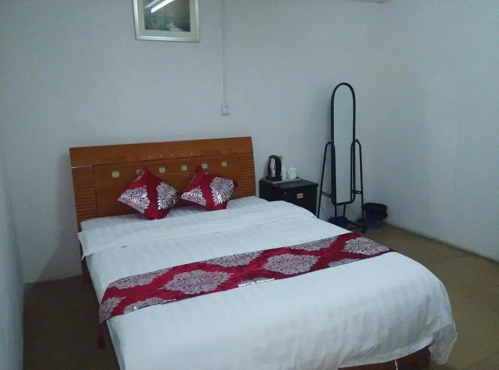 Гуанчжоу: Xinhao Apartment Guangzhou South Railway Station