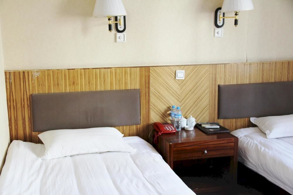 Циндао: Yimin Business Hotel