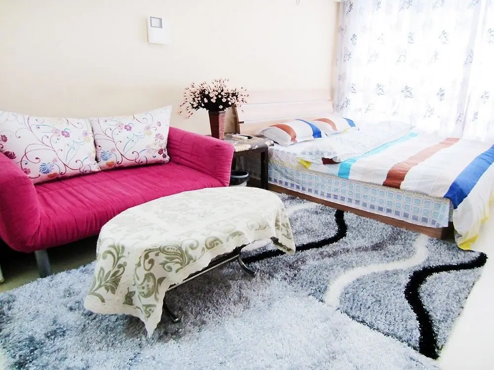 Циндао: Qingdao Noah Tourist Apartment (CBD Wanda Plaza)