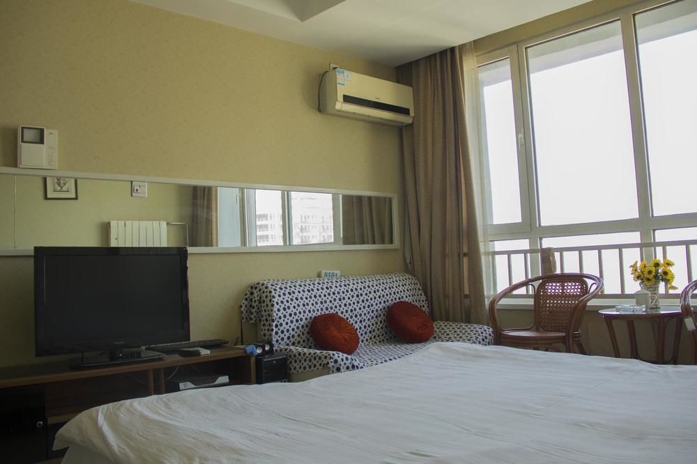 Циндао: Qingdao Noah Tourist Apartment (CBD Wanda Plaza)