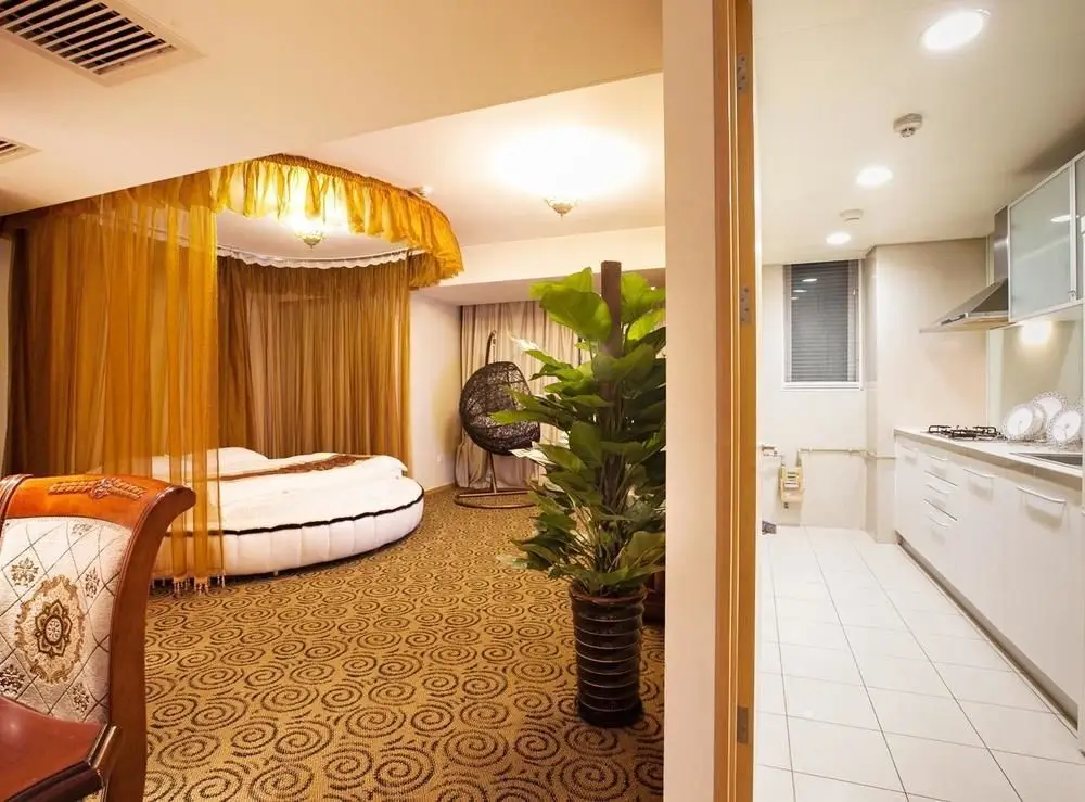 Пекин: Shiyu Round-bed Theme Service Apartment