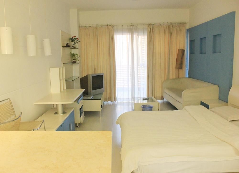 Шэньчжэнь: Xinhai Holiday Apartment