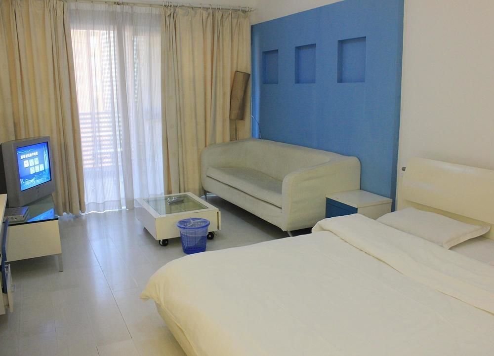 Шэньчжэнь: Xinhai Holiday Apartment