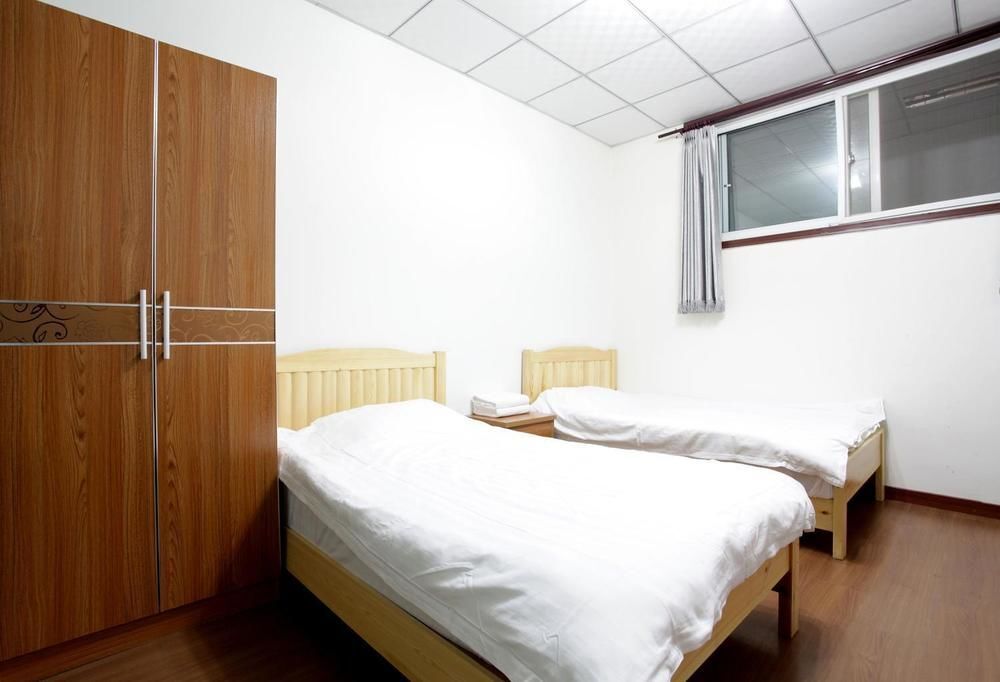 Пекин: Beijing Gujia Hotel Apartment