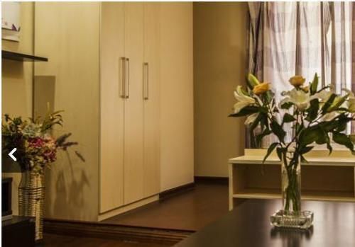Циндао: Qingdao Aikejia Apartment