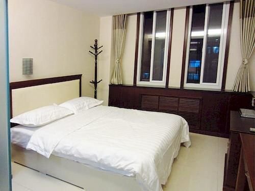 Циндао: Qingdao Mengsaiwang Hotel