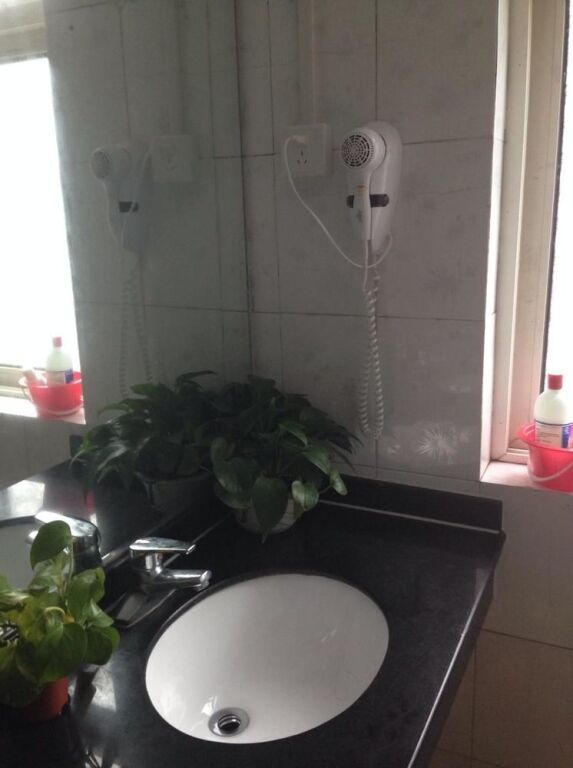 Циндао: Qingdao Junda Apartment