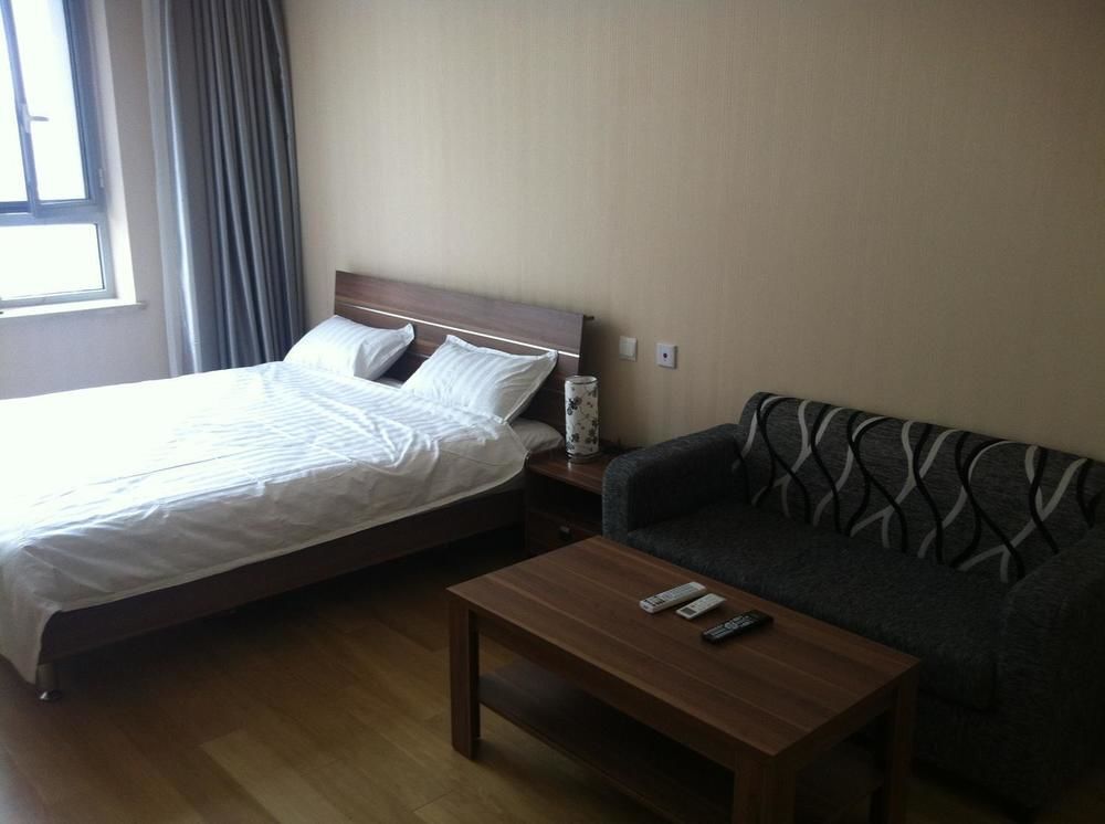 Далянь: Dalian Yashige Hotel Apartment