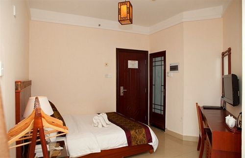 Санья: Qing Tian Yu Tan Service Apartment