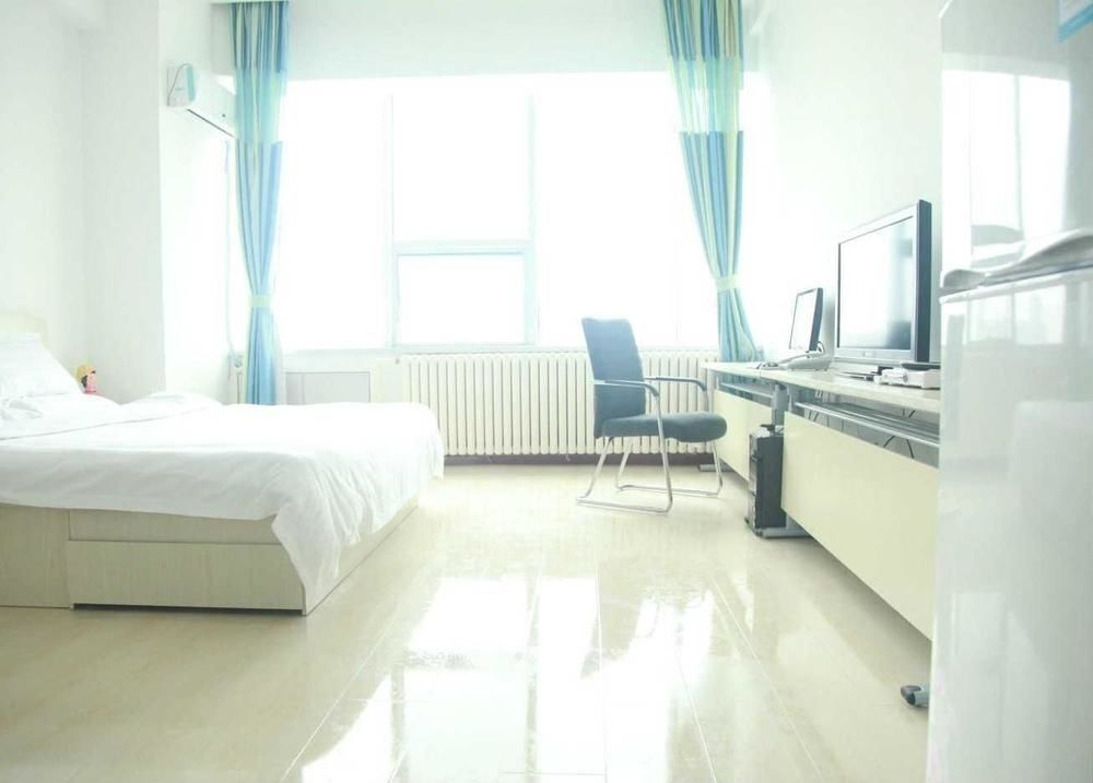 Далянь: Champs Elysees Jinfu Apartment