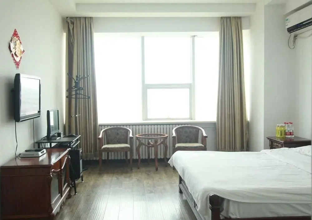Далянь: Champs Elysees Jinfu Apartment