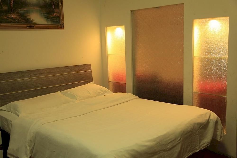 Далянь: Champs Elysees Jinfu Apartment