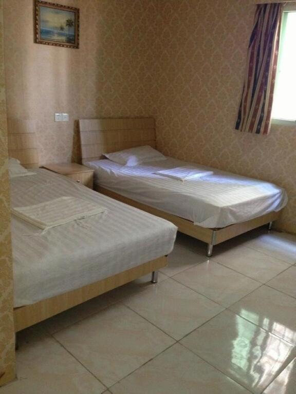 Сямынь: Xiamen Yiqing Apartment