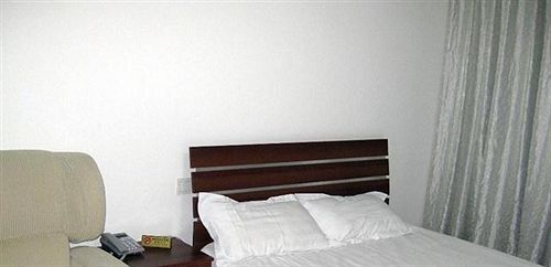 Циндао: Qingdao Heng He Four Business hotel