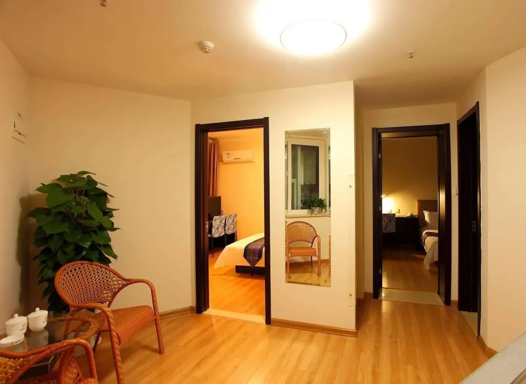 Циндао: Qingdao Xinlong Holiday Apartment