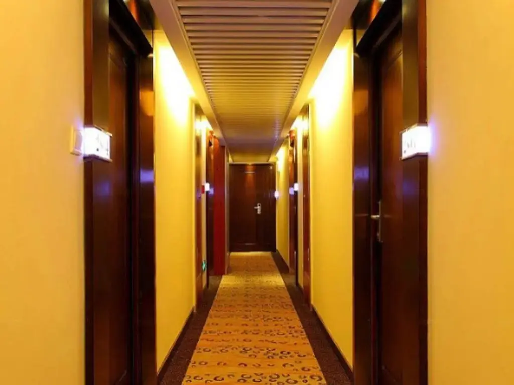Циндао: Qingdao Xinlong Holiday Apartment