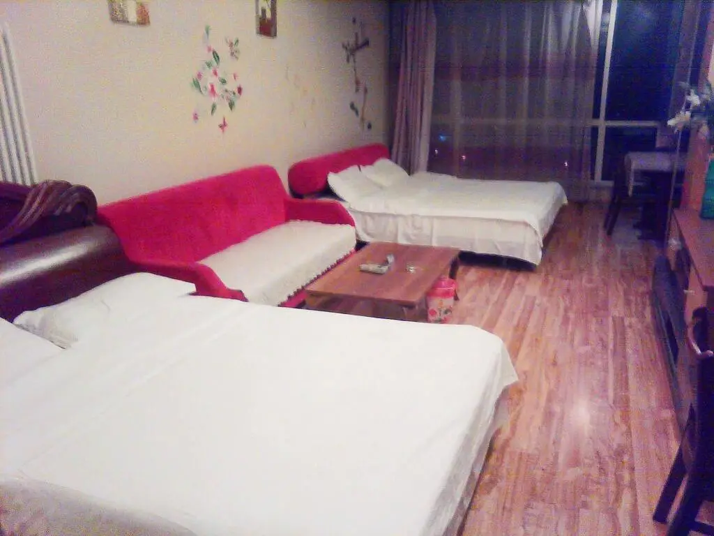 Далянь: Dalian Yijing Yuxuanting Hotel and Apartment