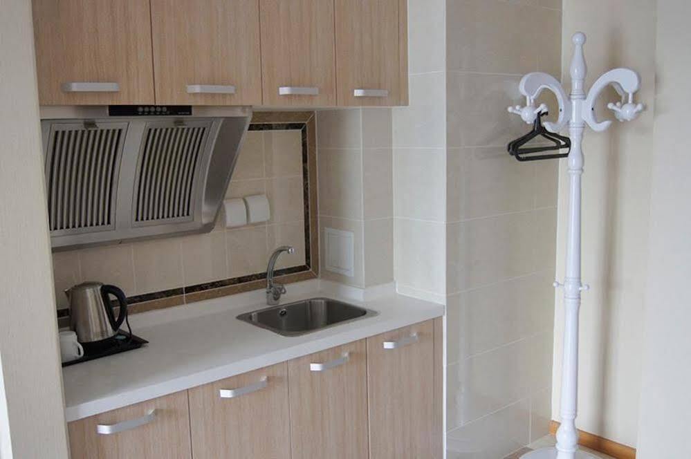Далянь: Best Coast Hotel Apartment