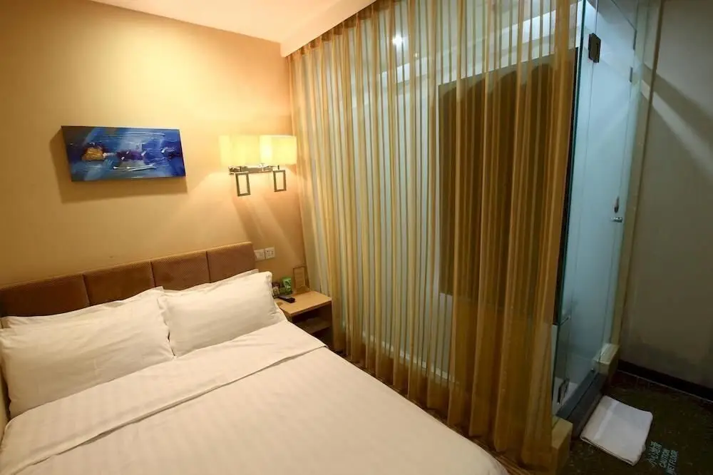 Циндао: Qingdao Yixin Hotel