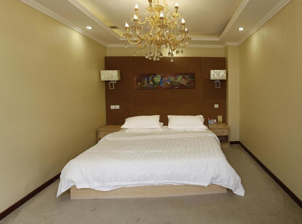 Циндао: Qingdao Yixin Hotel