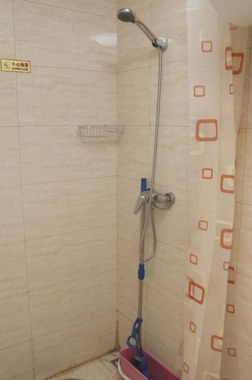 Циндао: Yiyaju Hotel Apartment Qingdao 7080 Central Square