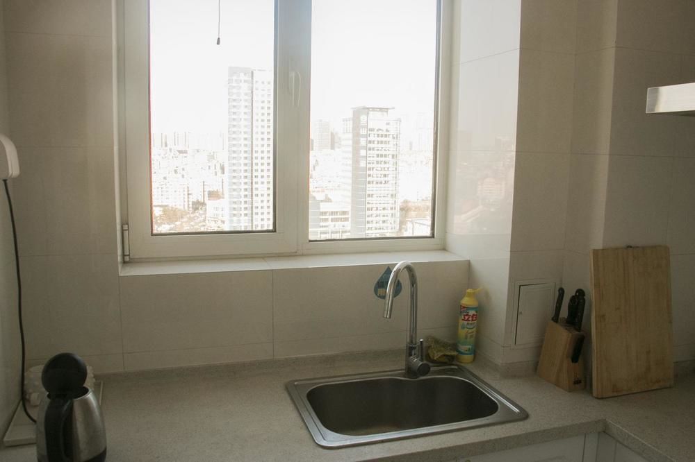 Циндао: Yiyaju Hotel Apartment Qingdao 7080 Central Square