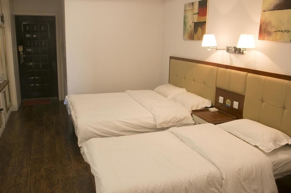 Циндао: Yiyaju Hotel Apartment Qingdao 7080 Central Square