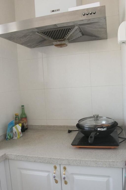 Циндао: Yiyaju Hotel Apartment Qingdao 7080 Central Square