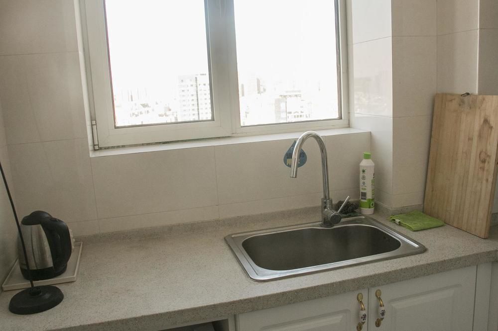 Циндао: Yiyaju Hotel Apartment Qingdao 7080 Central Square