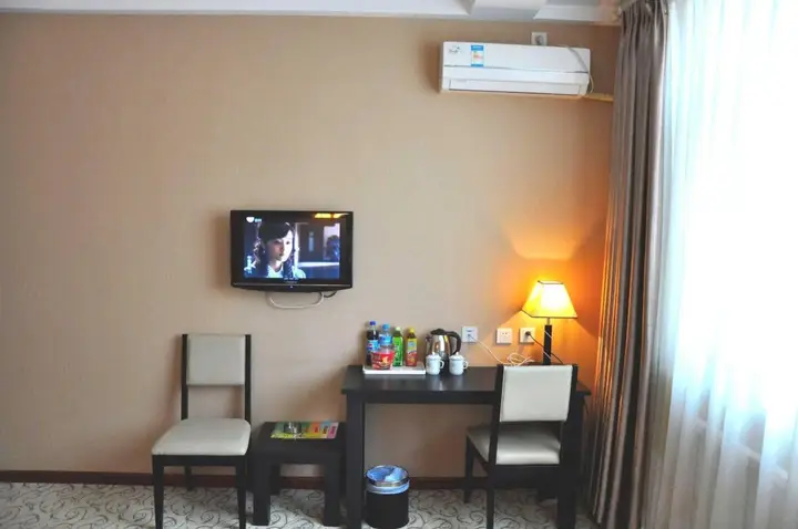 Далянь: Dalian Yijia Business Hotel