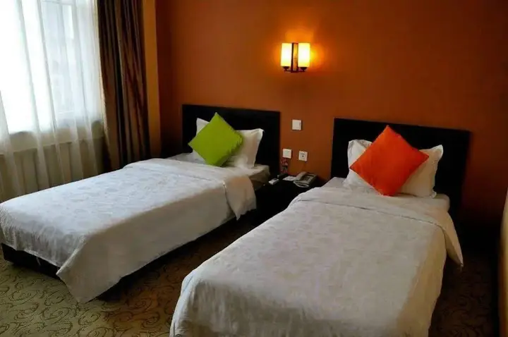 Далянь: Dalian Yijia Business Hotel