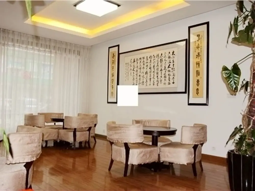 Циндао: Huijia Business Hotel - Qingdao