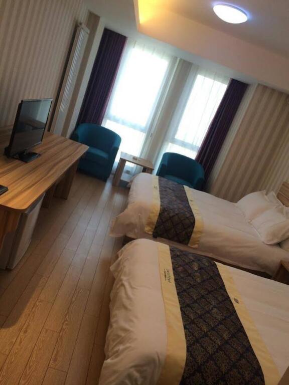 Циндао: Tujia Sweetome Apartment Qingdao Golden Square