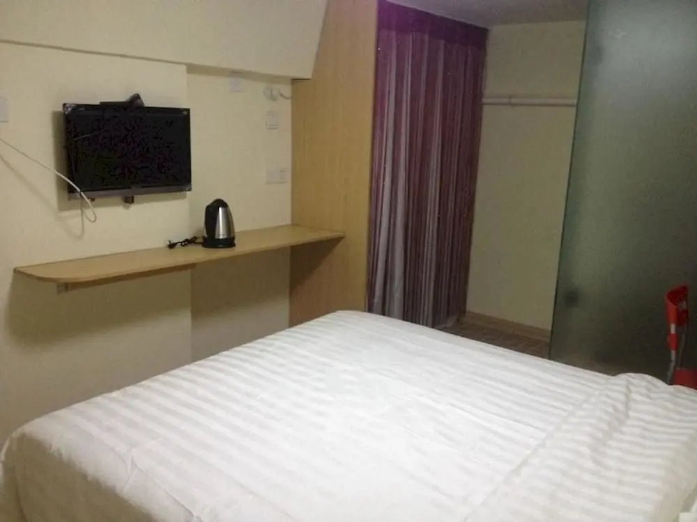 Циндао: Aige Hotel