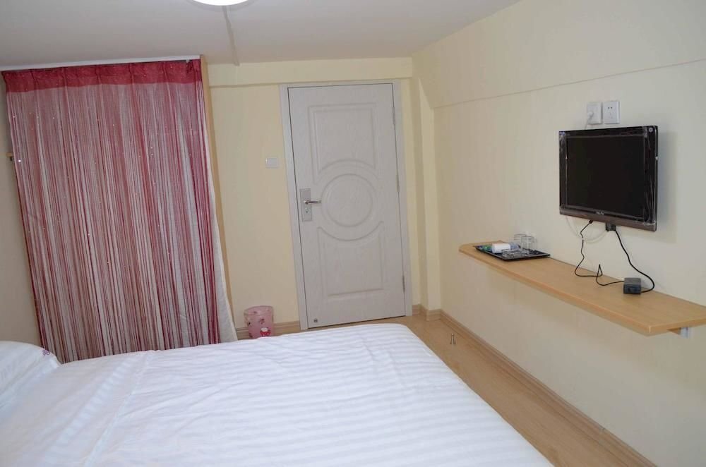 Циндао: Aige Hotel