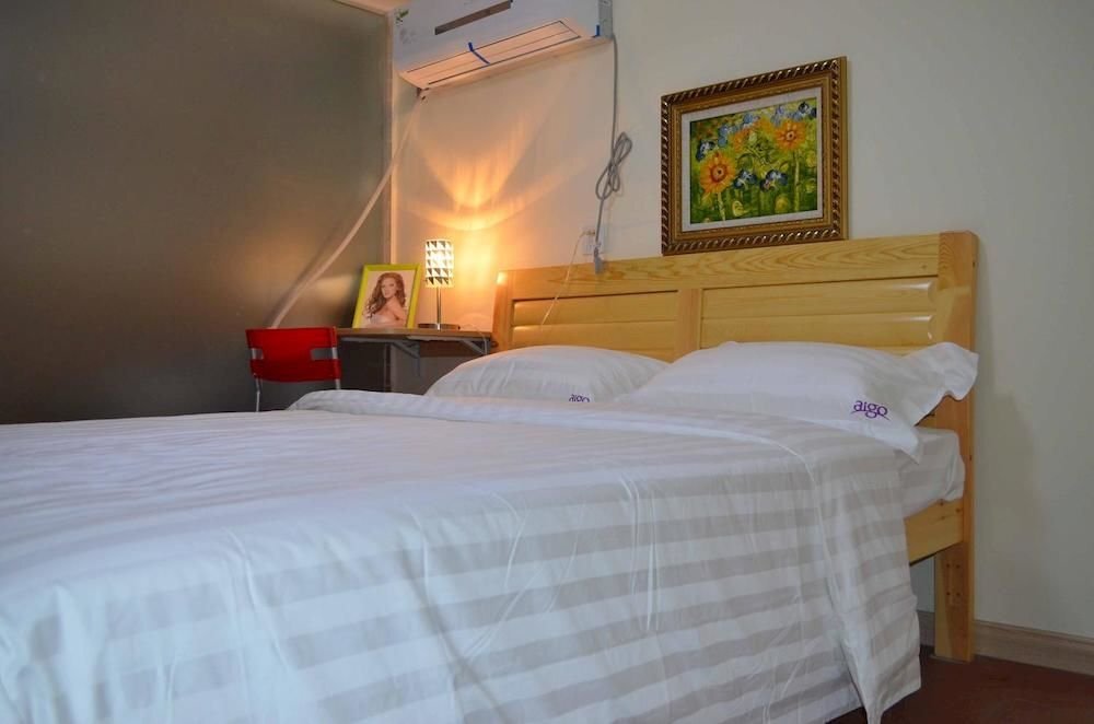 Циндао: Aige Hotel