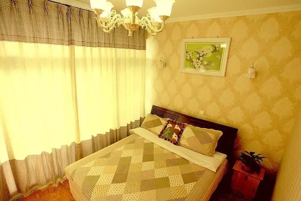 Циндао: Qingdao Yaxin Sea View Apartment