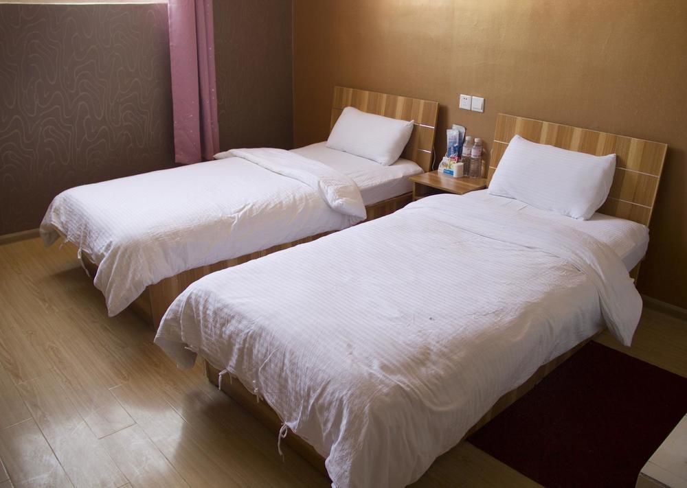 Циндао: Qingdao Qianshanhouhai Apartment
