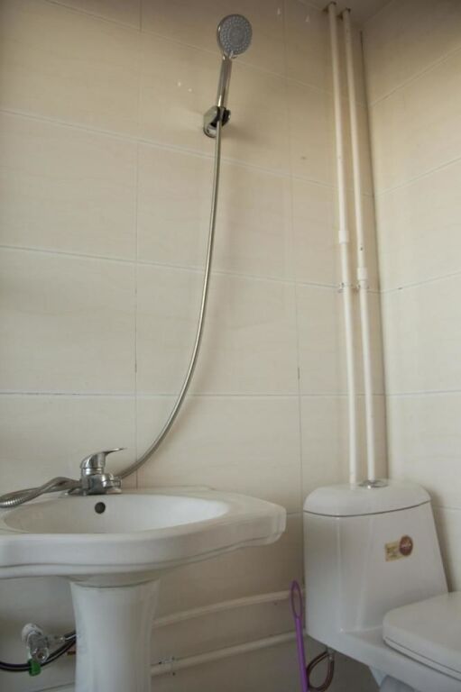 Циндао: Qingdao Qianshanhouhai Apartment
