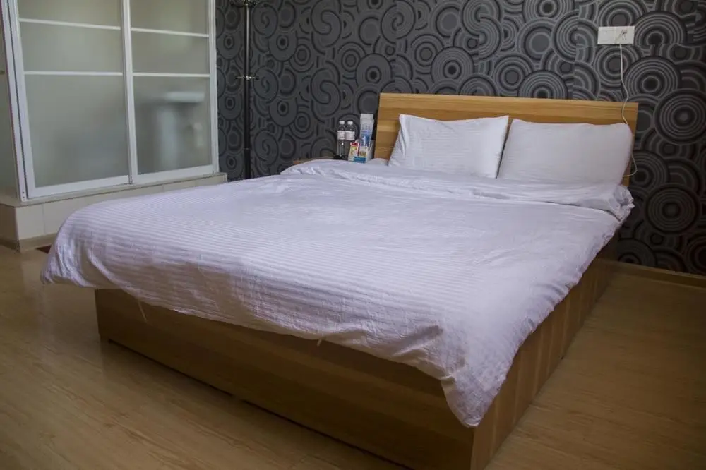 Циндао: Qingdao Qianshanhouhai Apartment