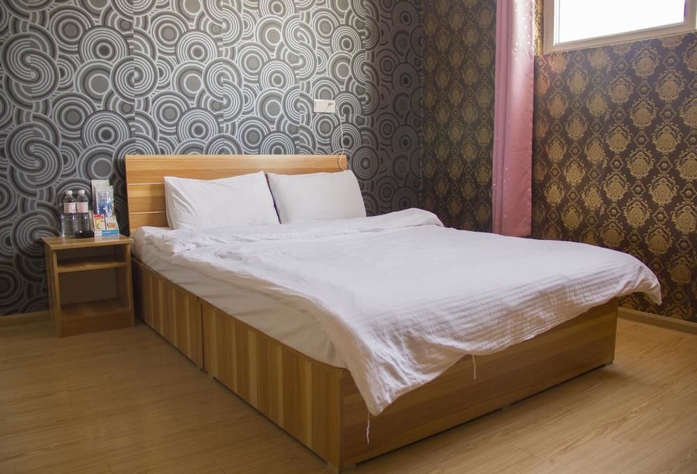 Циндао: Qingdao Qianshanhouhai Apartment